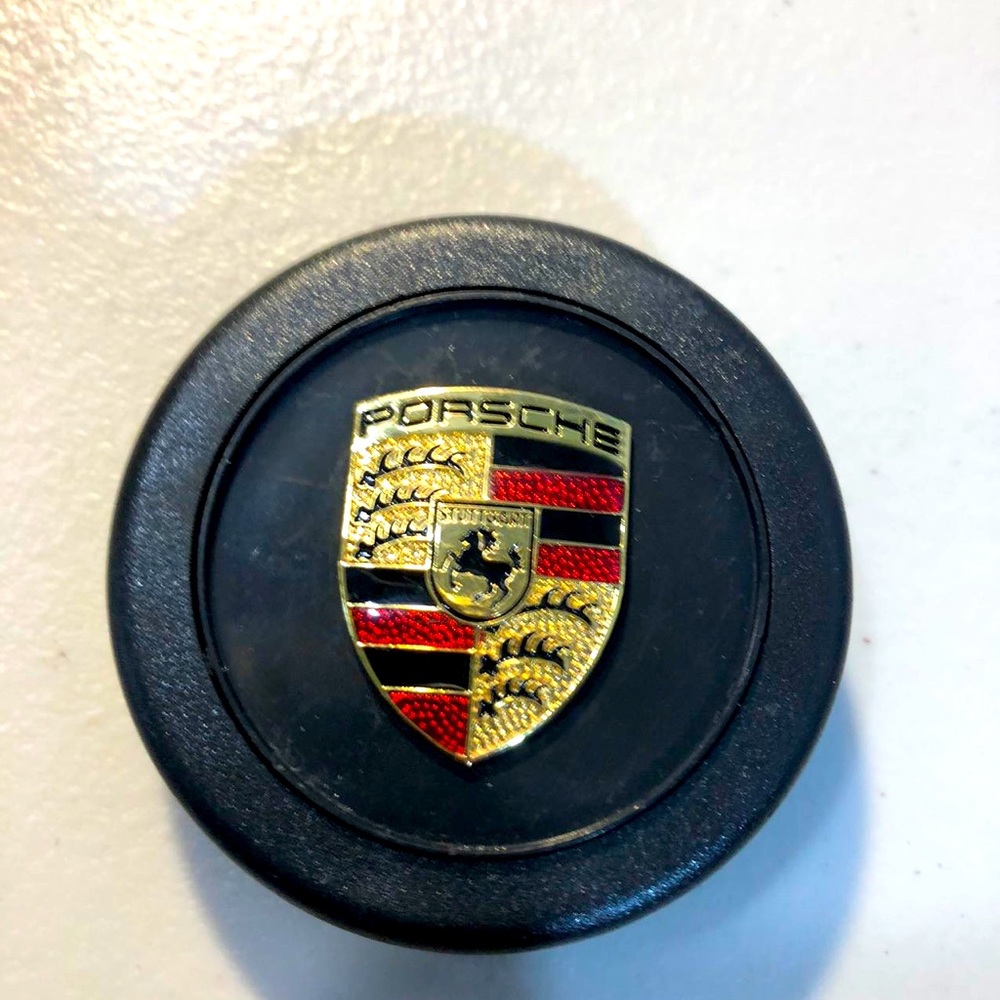 Porsche horn button fits 320, 330, 340, 350 mm steering wheels.